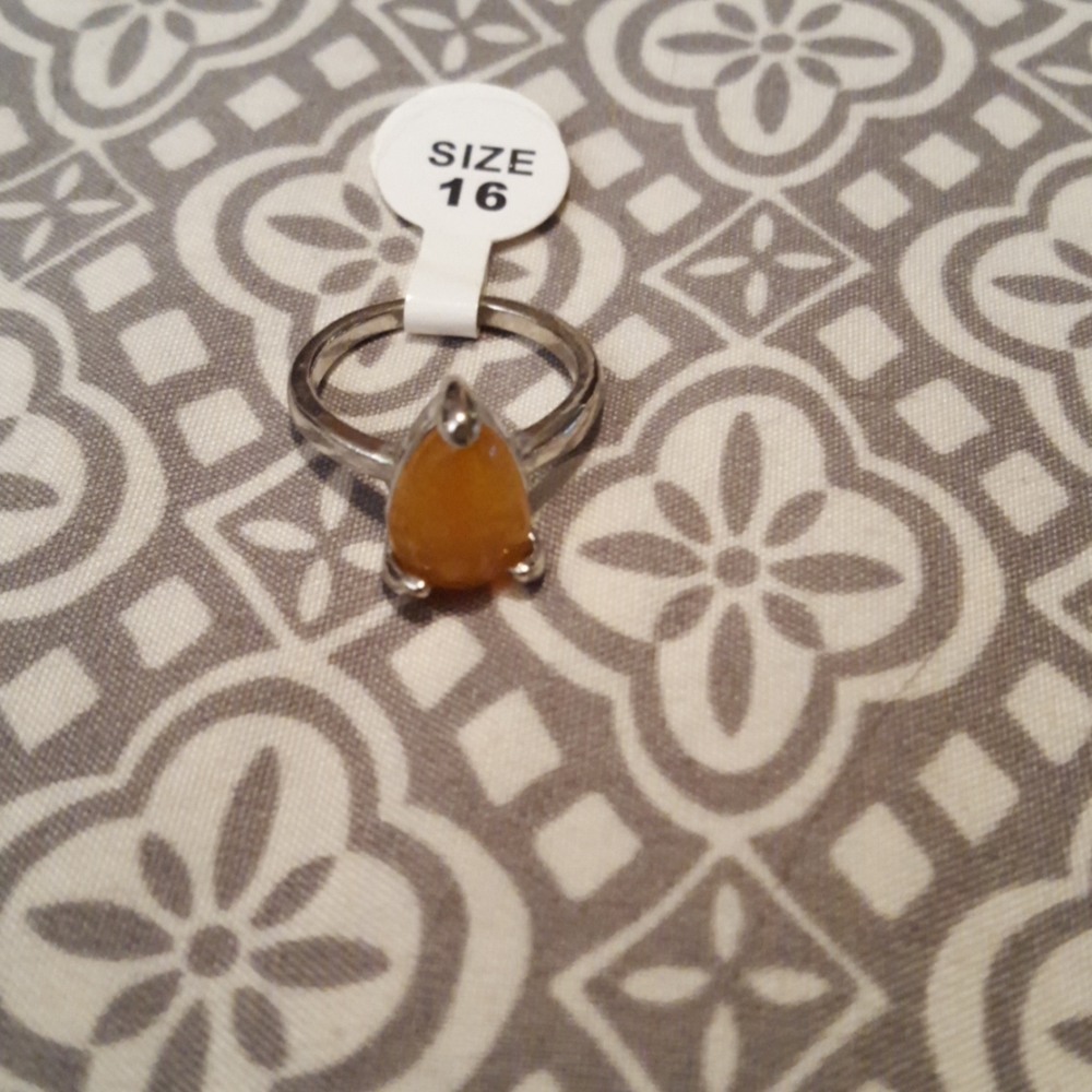 Tear drop shape yellow stone ring